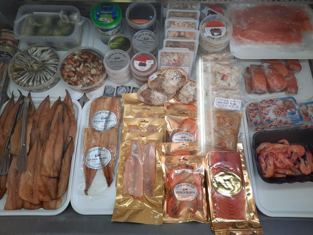 Inside the Catch of the Day shop at 54 Fore Street, Kingsbridge, the counter with the day's catch on ice